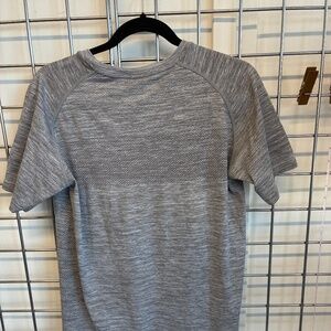 Three Nails active wear shirt.